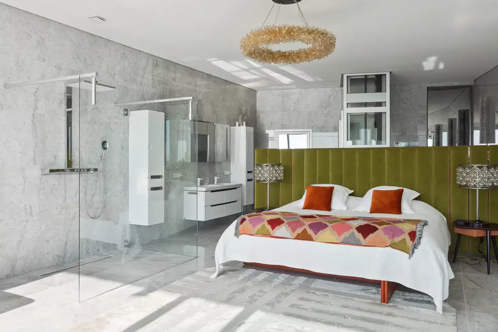 La chambre et sa salle de bain ouverte