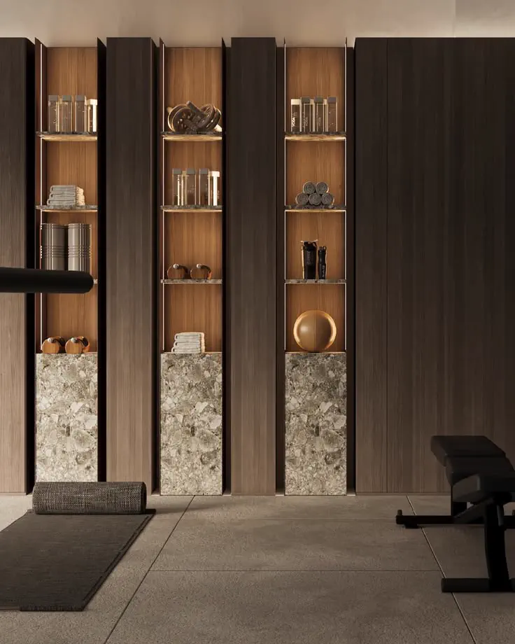 Rangements de bois sombre et pierre, banc de musculation